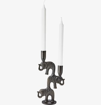 Bild av unik ljusstake med elefanter och vita ljus