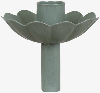 Bild av detaljrik ljushållare med blombladstruktur