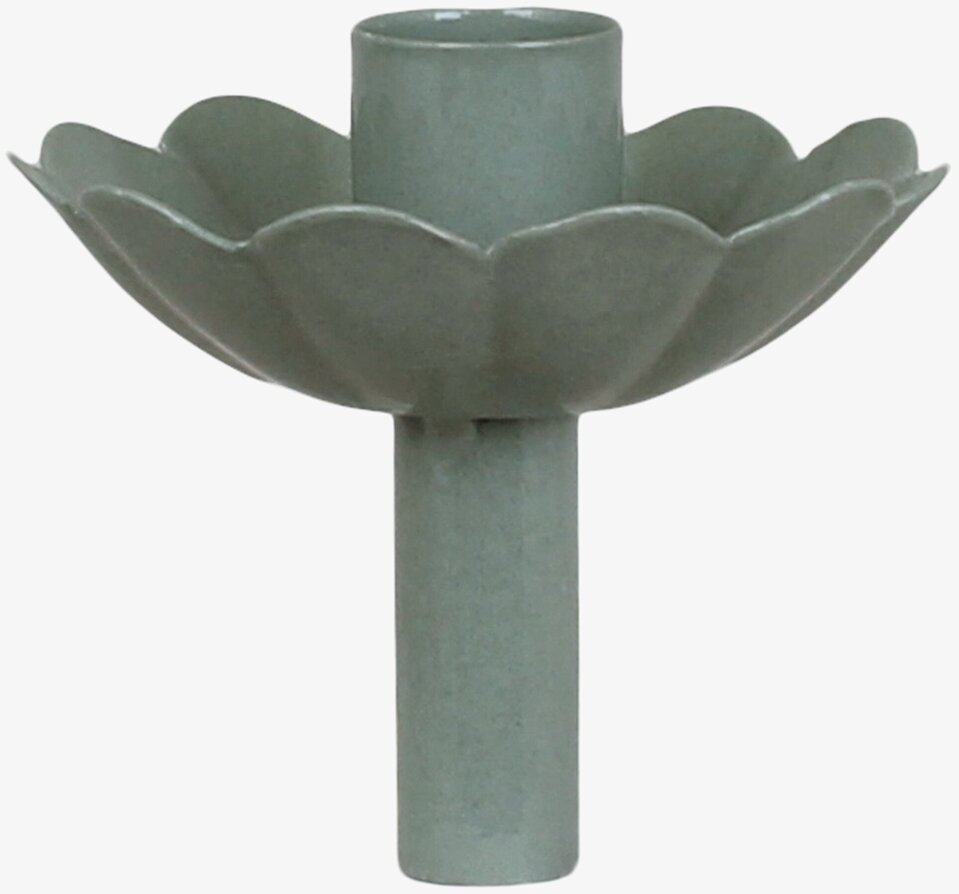 Bild av detaljrik ljushållare med blombladstruktur