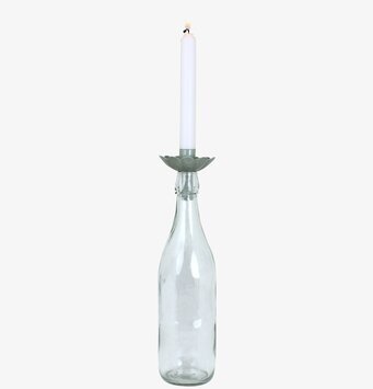 Foto av stilren ljushållare i glas och grön metall