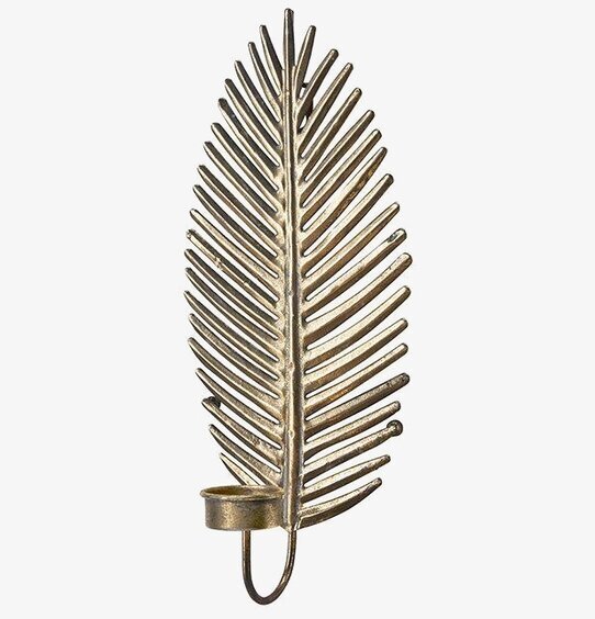 Bild av stilren väggljusstake i antik mässing