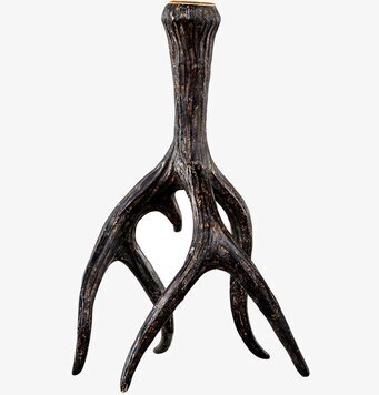 Foto av ljusstake med naturinspirerad design