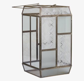 Bild av ljuslykta i frostat glas med mässingsdetaljer