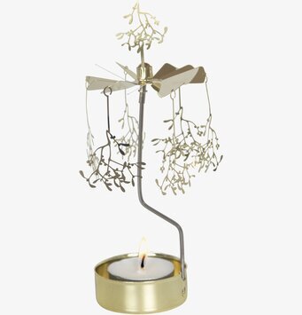 Bild av en elegant ljuslykta med mistelelement