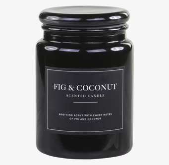 Foto av elegant doftljus i stilren glasbehållare