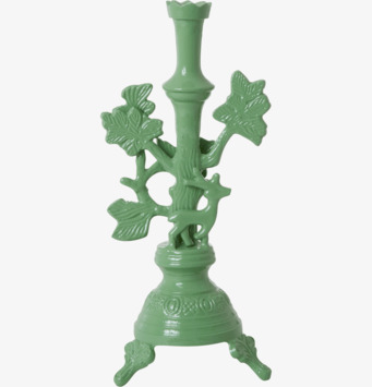 Bild av elegant ljusstake i dammig grönton