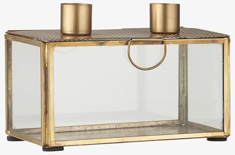 Bild av elegant ljusstake i glas och mässing