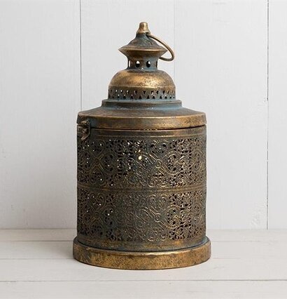 Ljuslykta Sirlig Metall från Multi Agentur på träpanel