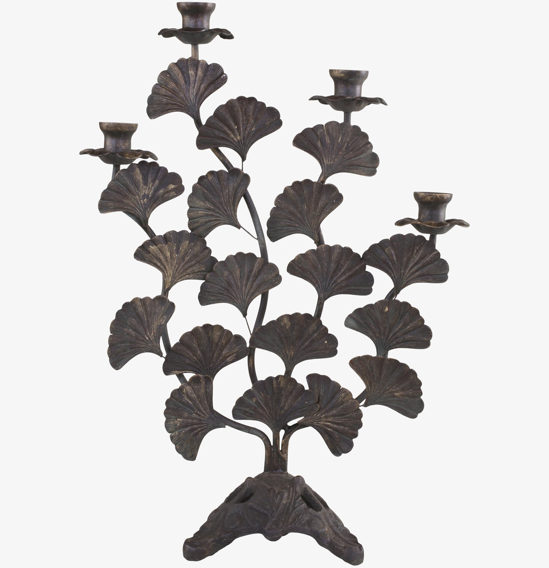 Foto av antik mässing ljusstake med naturinspiration