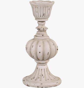 Foto av en elegant antikgrå ljusstake med klassisk design