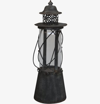 Foto av antik ljuslykta med patinerad metallfinish