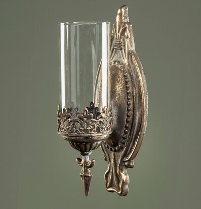 Bild av elegant ljushållare i guldbrun nyans