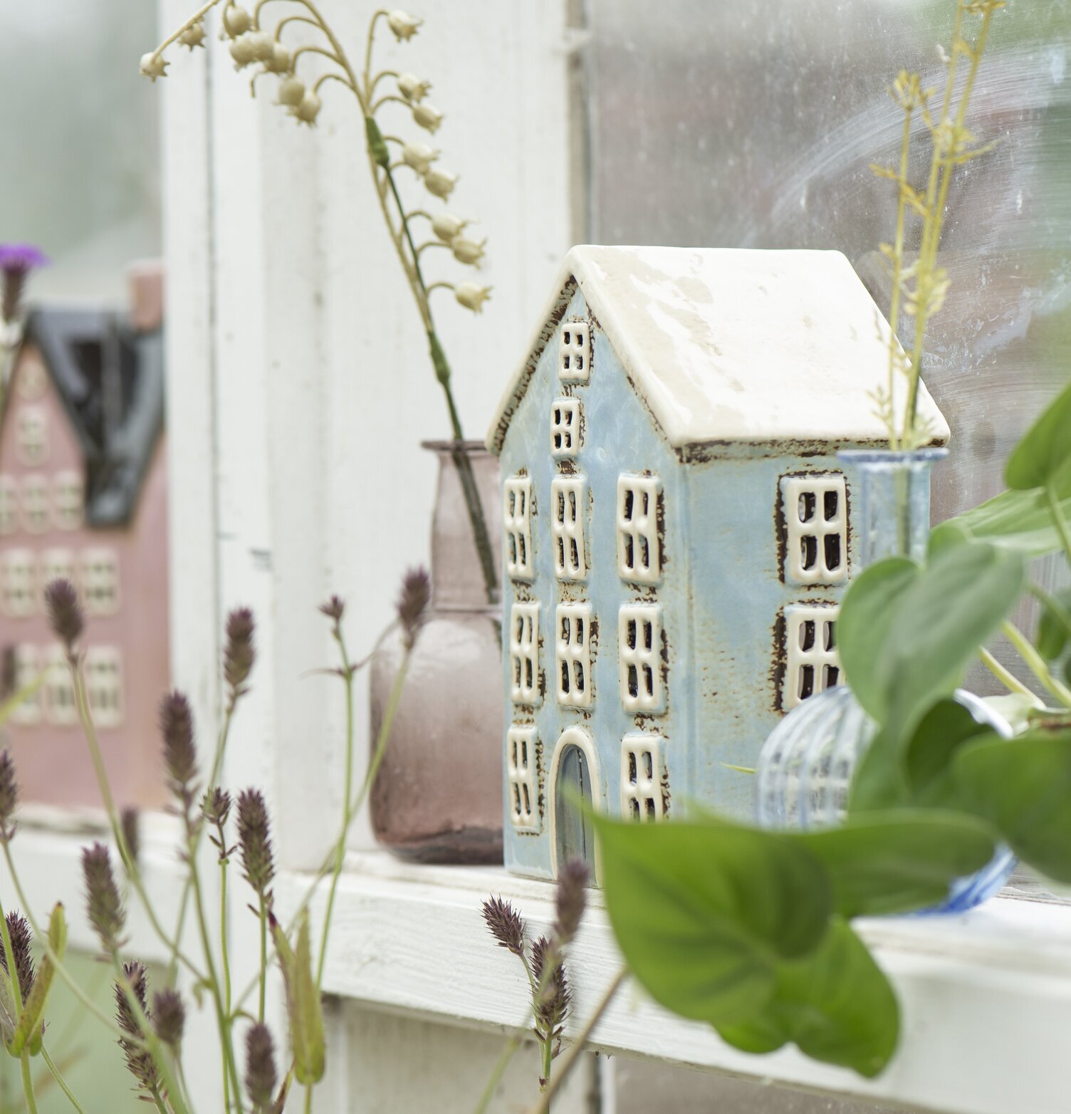 Ljuslykta Nyhavn Ljusblå från IB Laursen på fönsterbräda
