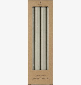 Bild av askgrå stearinljus i minimalistisk förpackning
