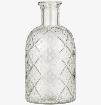 Bild av elegant, designfokuserad ljuslykta i glas