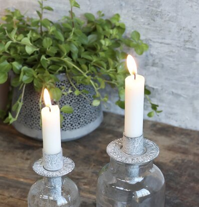 Bild av ljushållare i en mysig och inbjudande miljö