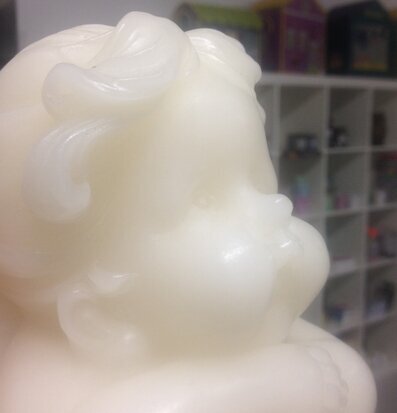 Bild av detaljerad stearinljusängel med drömlik kvalitet