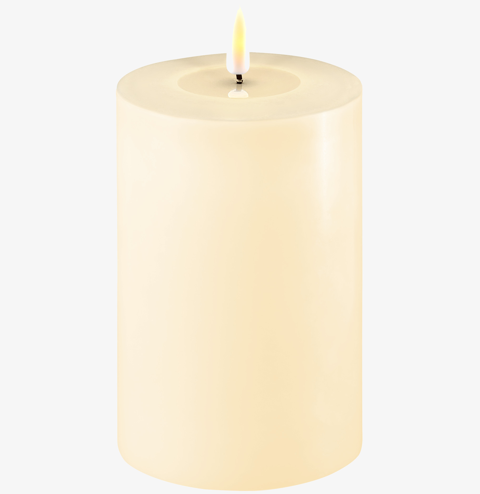 Bild av crèmefärgat LED-blockljus med realistisk låga