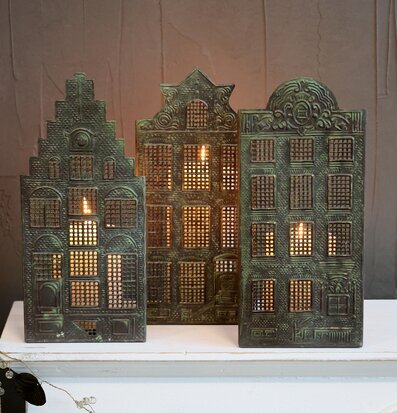 Bild av dekorativa ljushållare i antik mässingsfinish