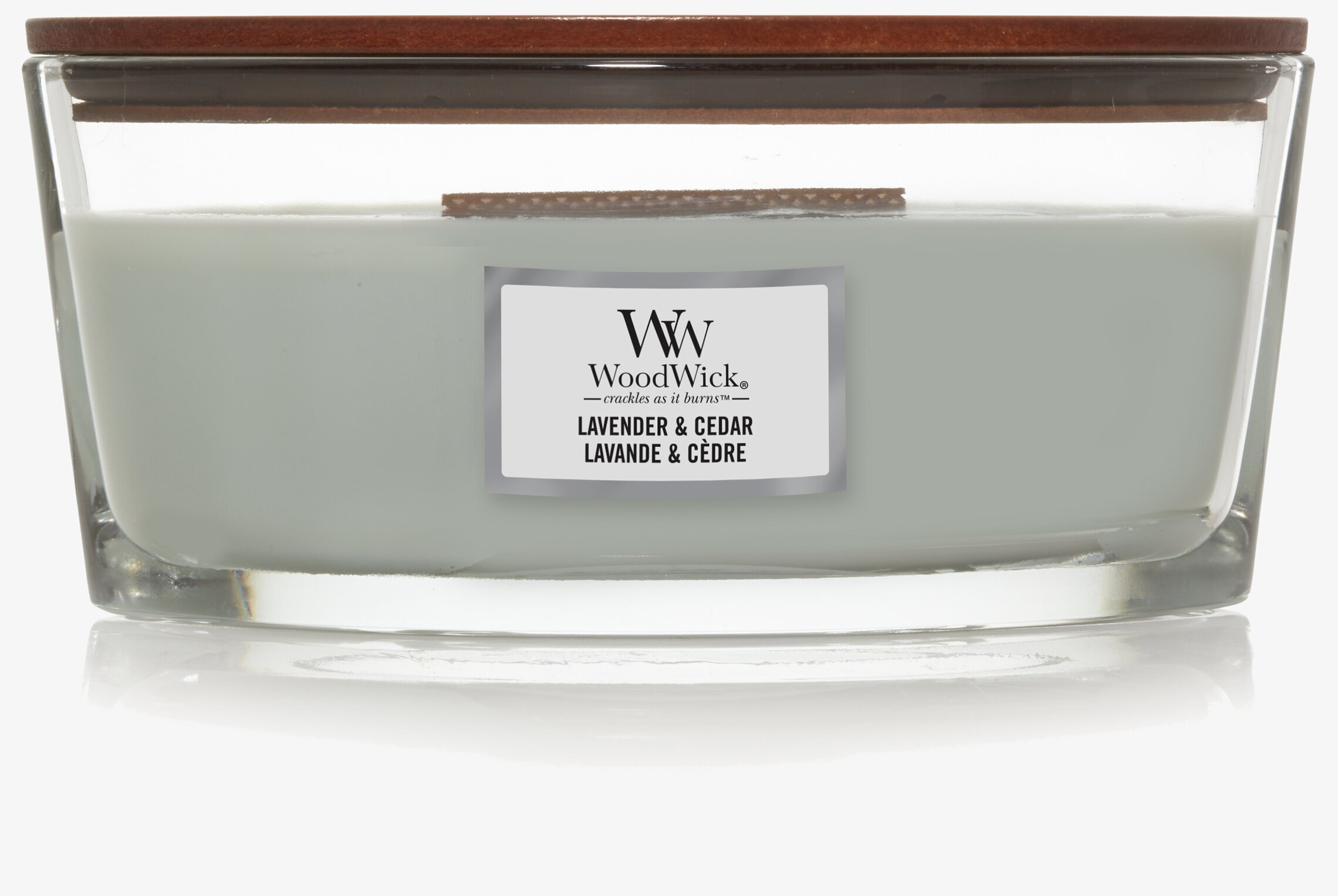 Bild av elegant ljuslykta med trälock och glasbehållare