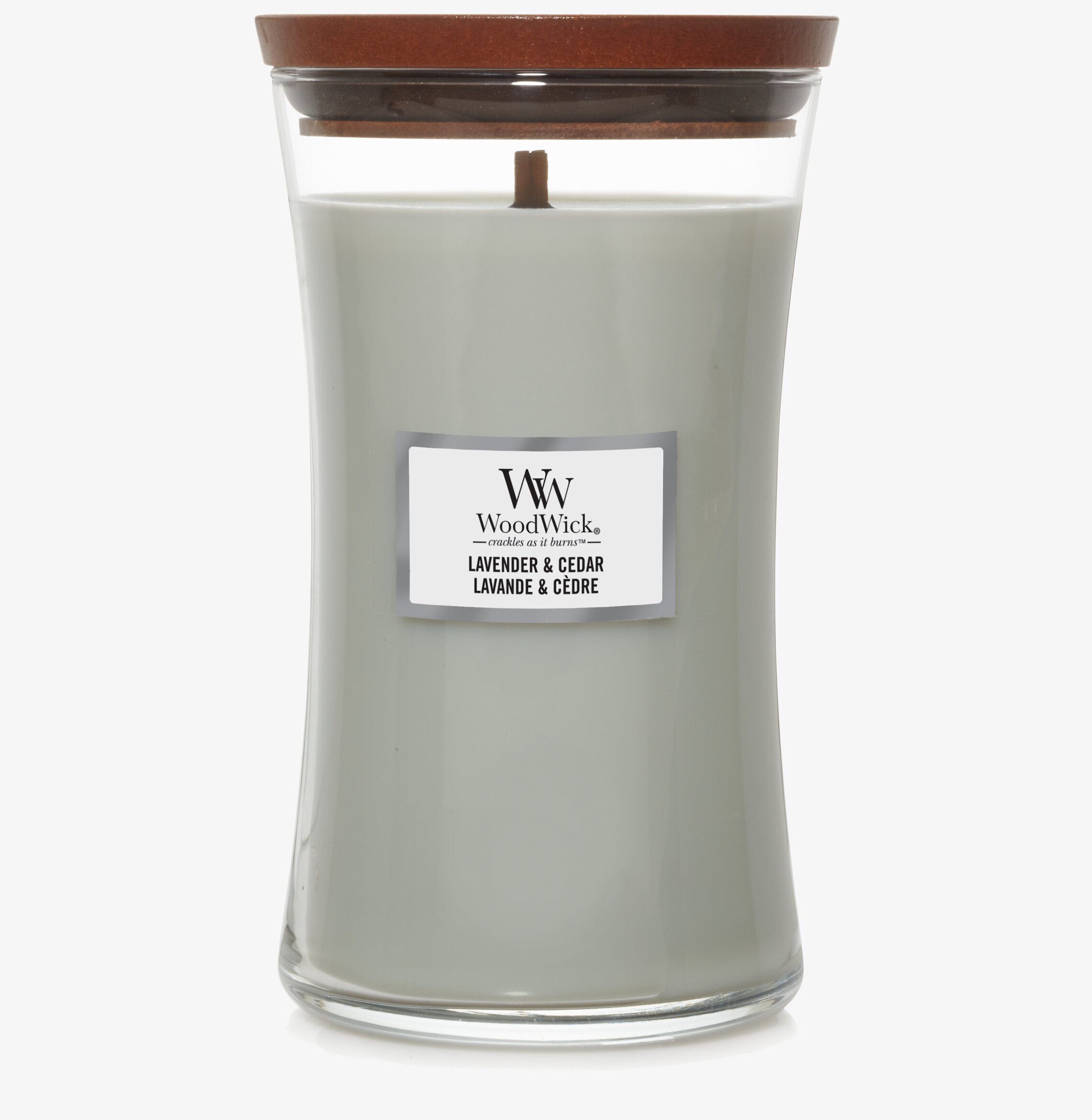 Bild av ljuslykta med trälock och krämfärgat ljus