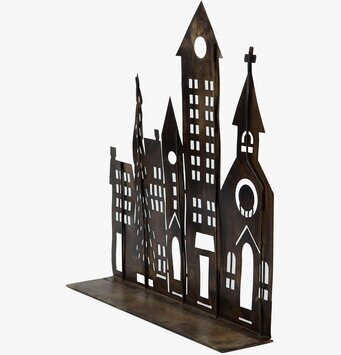 Bild av dekorativ ljuslykta i antikbrun stadssiluett