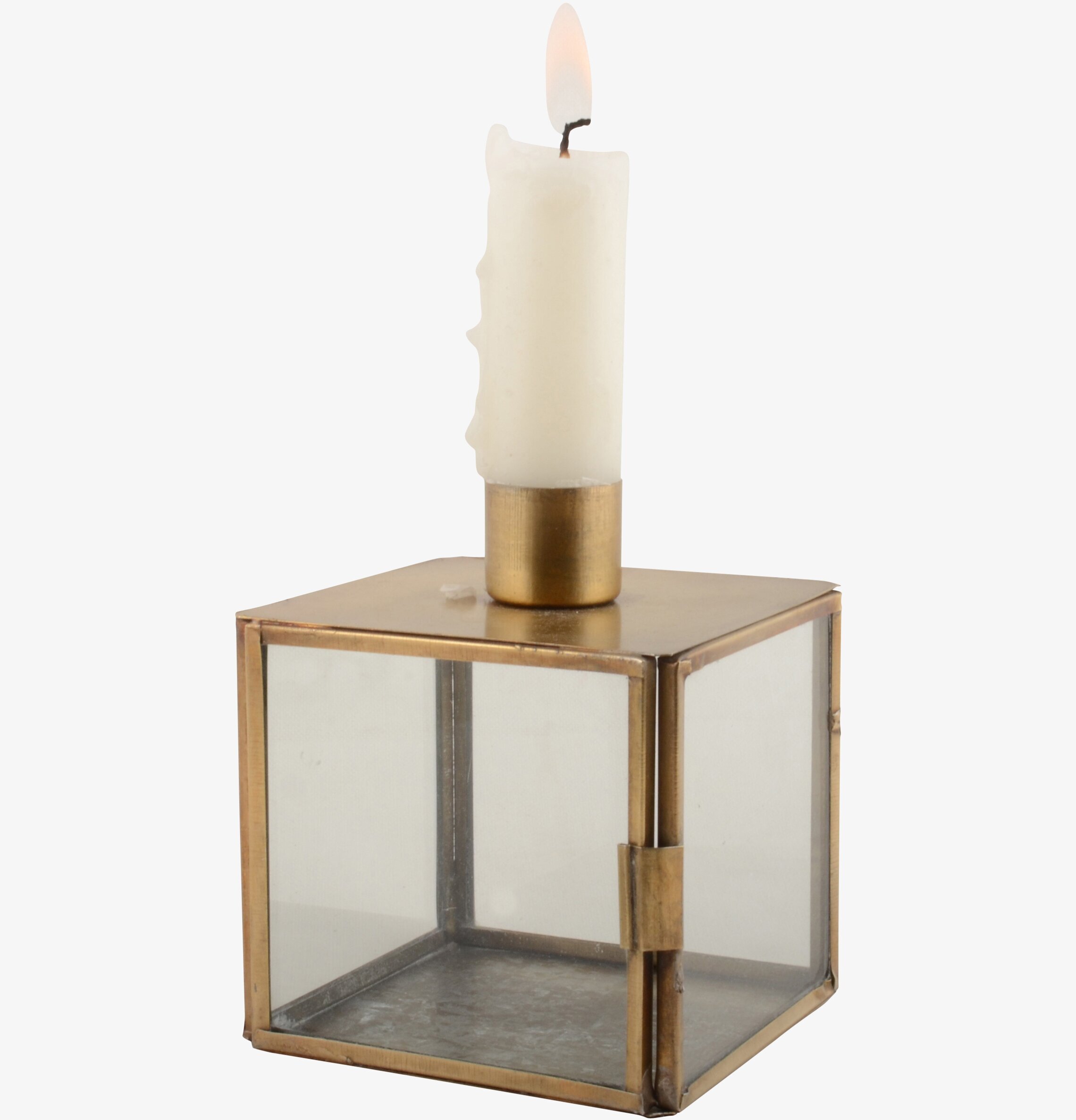 Bild av elegant glasljusstake med mässingstonad metall