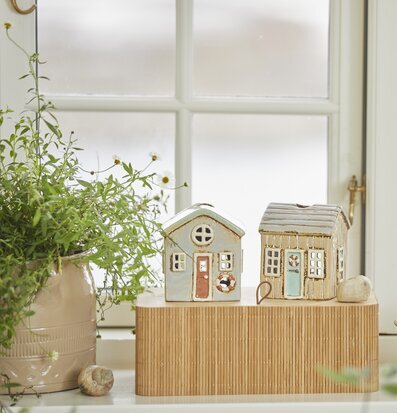 Ljuslykta Løkken Beige/Turkos från IB Laursen på träplatta