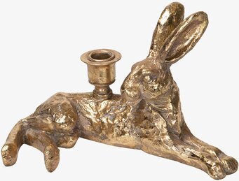 Bild av gyllene ljusstake formad som liggande hare