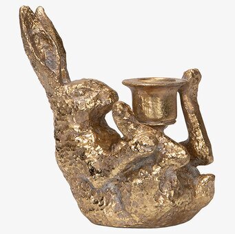 Bild av unik gyllene ljusstake formad som en hare