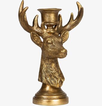 Bild av elegant hjortformad ljusstake i gyllene ton