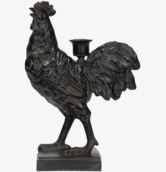 Foto av dekorativ ljusstake i form av en tupp