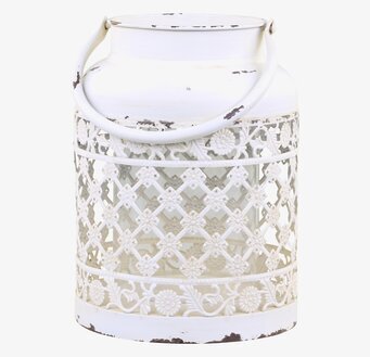 Foto av antik ljuslykta med dekorativt mönster