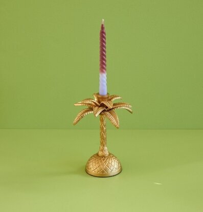 Bild av elegant ljusstake med exotisk palmform