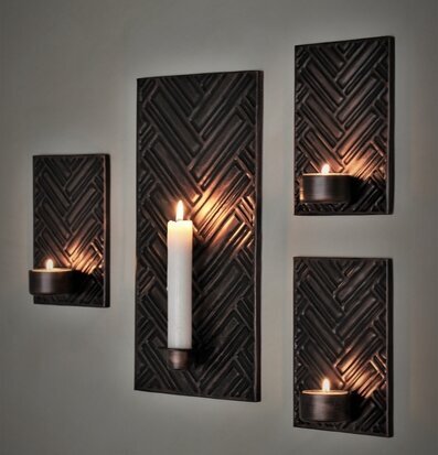 Bild av dekorativa väggljushållare med fiskbensdesign