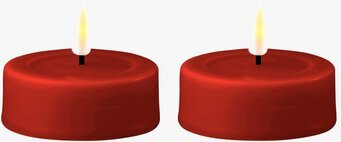 Bild av LED-värmeljus i djup bordeauxfärg