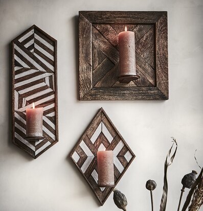 Bild av vackra väggljushållare i geometriska former