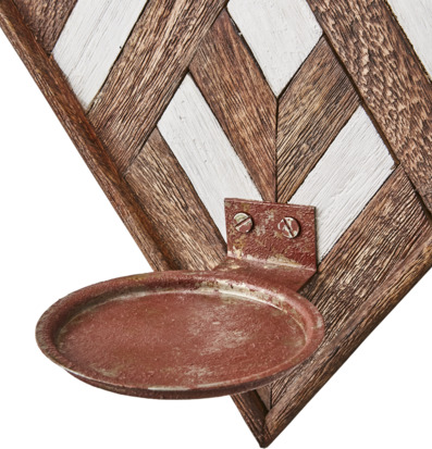 Bild av stilfull väggljushållare i trä och metall