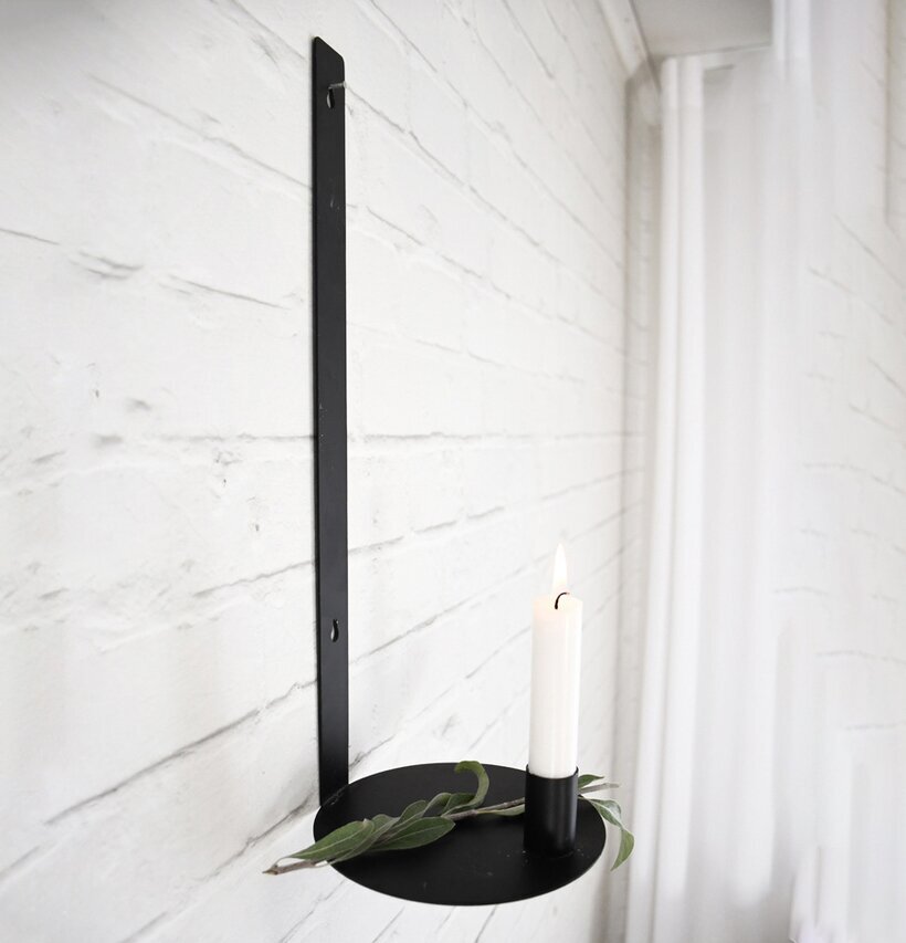 Väggljusstake Närsbo från Storefactory på vit tegelvägg