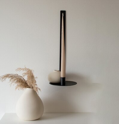 Bild av elegant väggljusstake med vas och växter