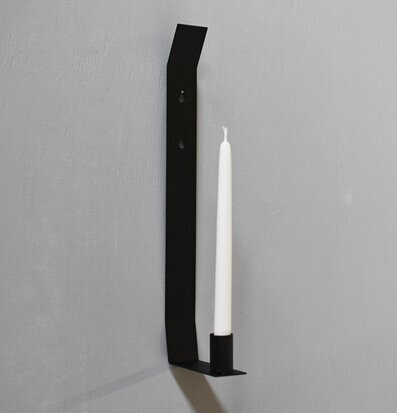 Foto av stilren väggljusstake i skandinavisk design