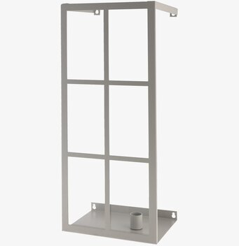 Foto av stilren väggljusstake i metall och greige