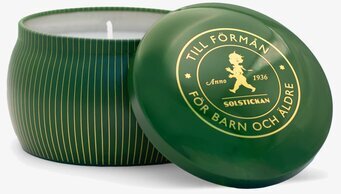 Foto av elegant doftljus i grön och gyllene design