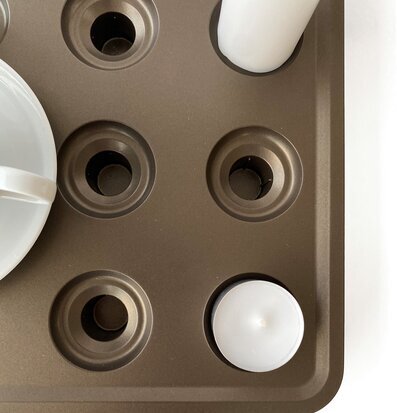 Bild av elegant och mångsidig ljushållare i brons