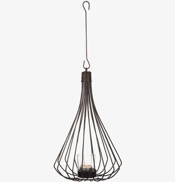 Bild av elegant ljuslykta med smide och glasdetaljer