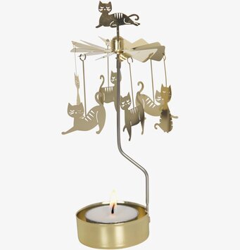 Bild av ett dekorativt änglaspel med kattformade figurer