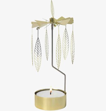 Bild av en elegant och snurrande ljuslykta i metall