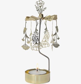 Bild av elegant ljuslykta med snurrande blommotiv