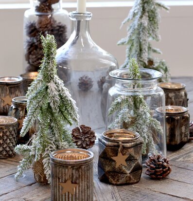 Ljuslykta Med Stjärna 10xØ10cm från Chic Antique i vintermiljö