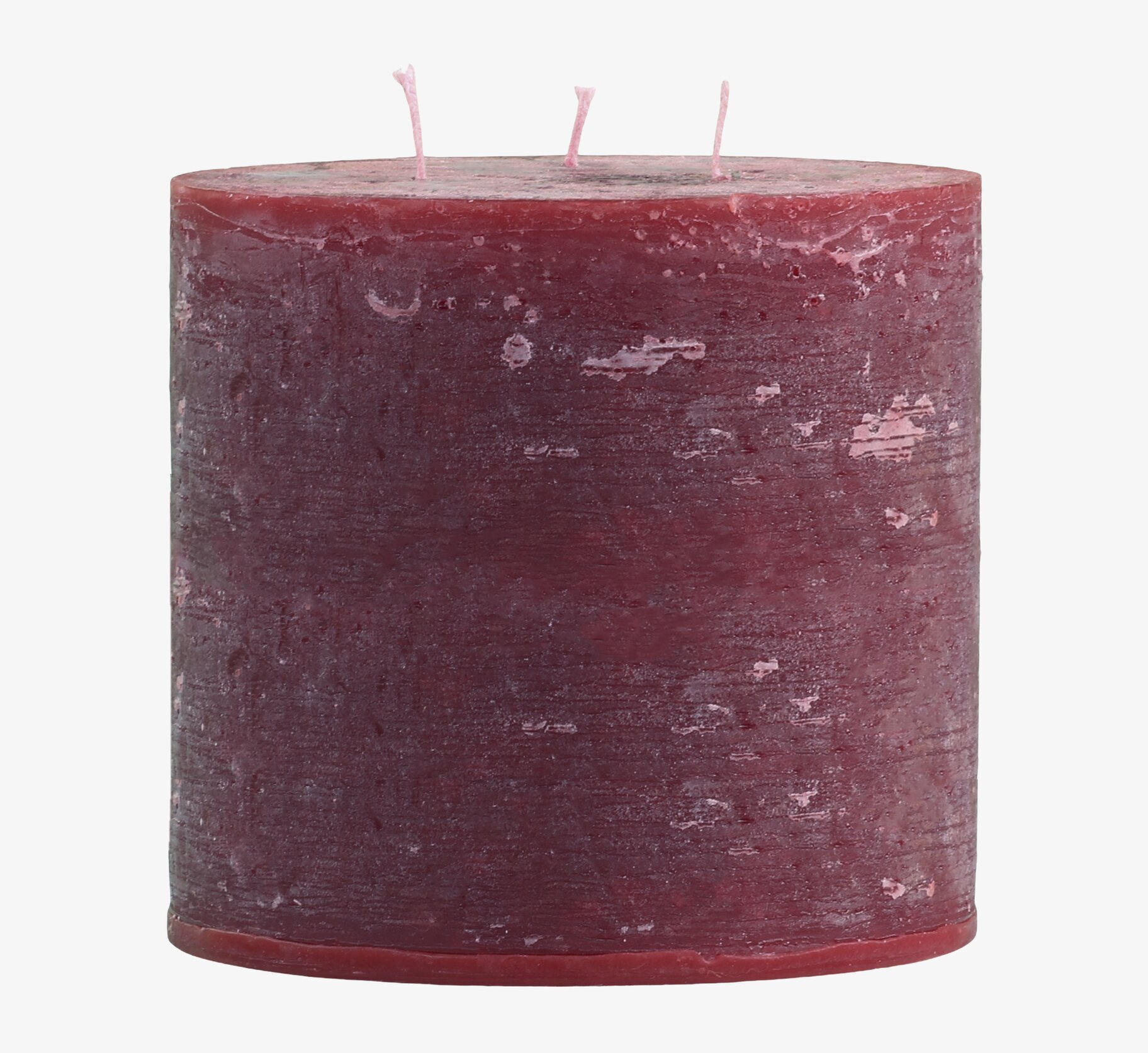 Bild av mörkrött blockljus med rustik finish